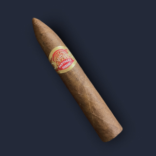 A Partagás Serie P No. 2 pirámide in a cream, gold and red band, its tapered head resting on a dark backdrop.