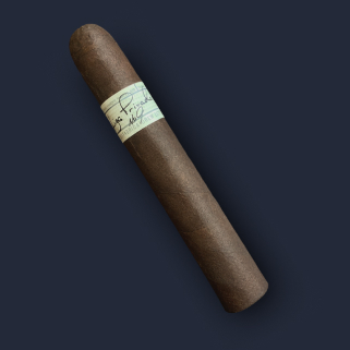 A Liga Privada No. 9 toro in dark Broadleaf wrapper, banded in pale green with cursive script, against a navy backdrop.